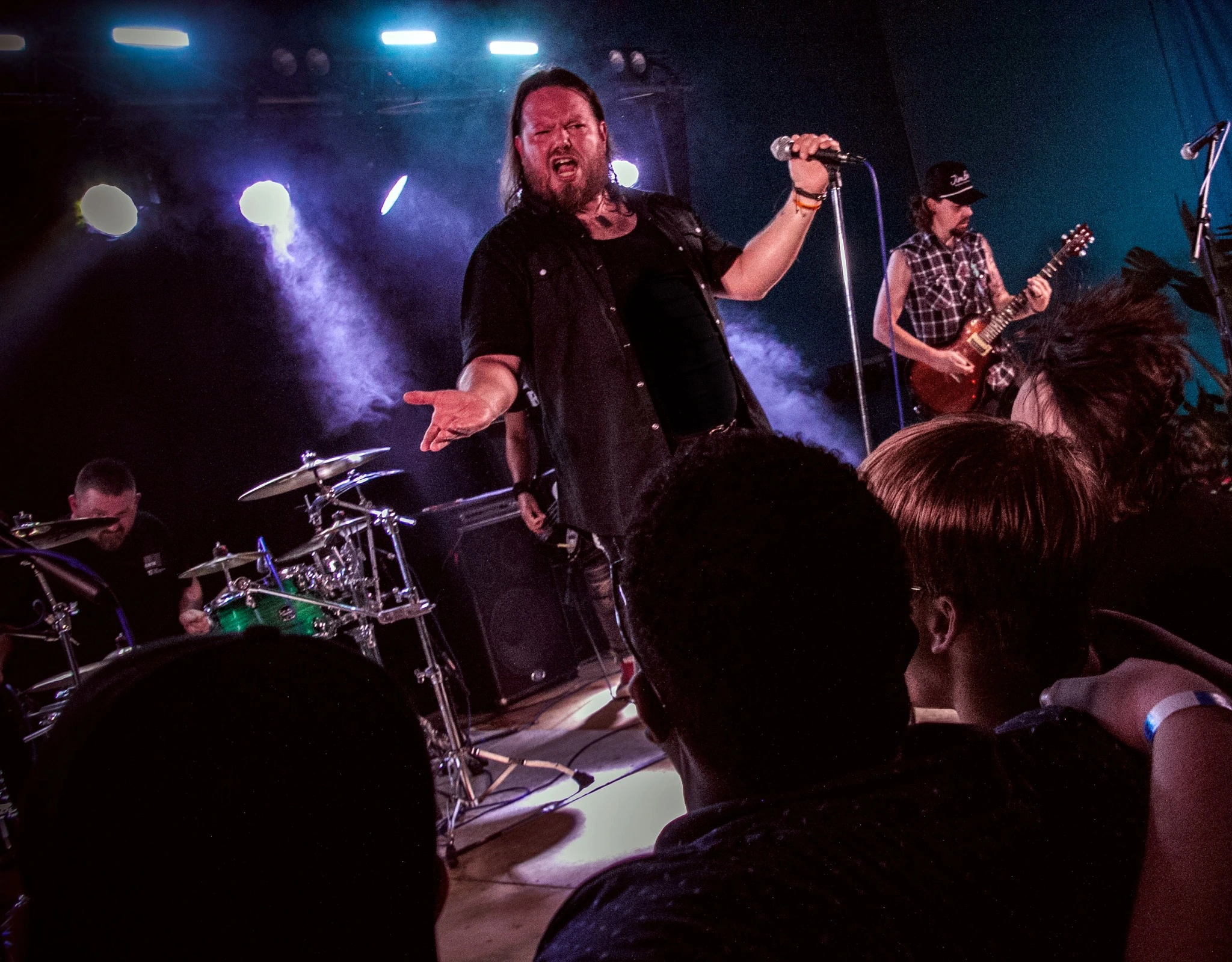Claim To Flame vocalist Miles Kramer performing live with the band