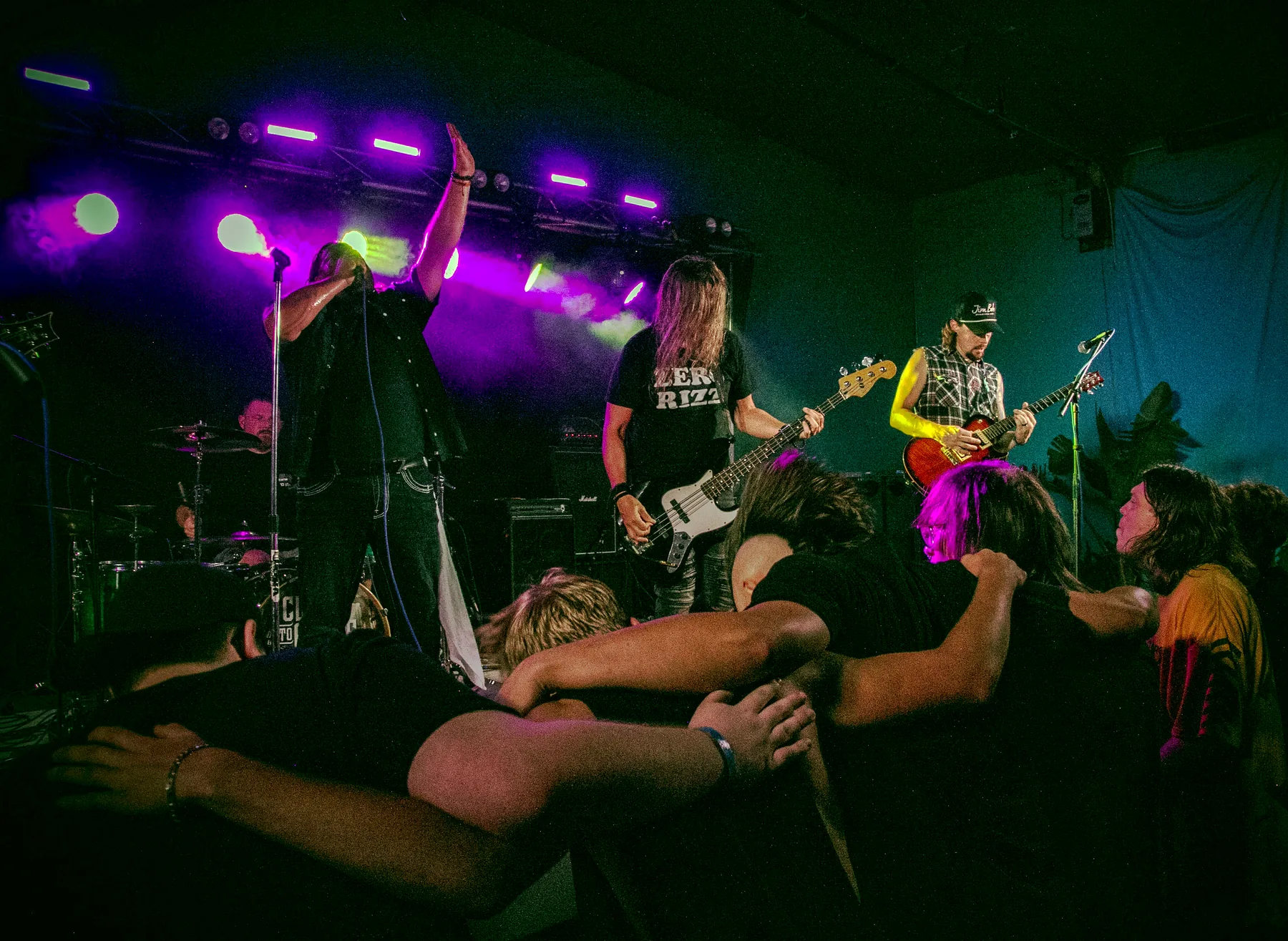 Claim To Flame performing together at the front of the stage